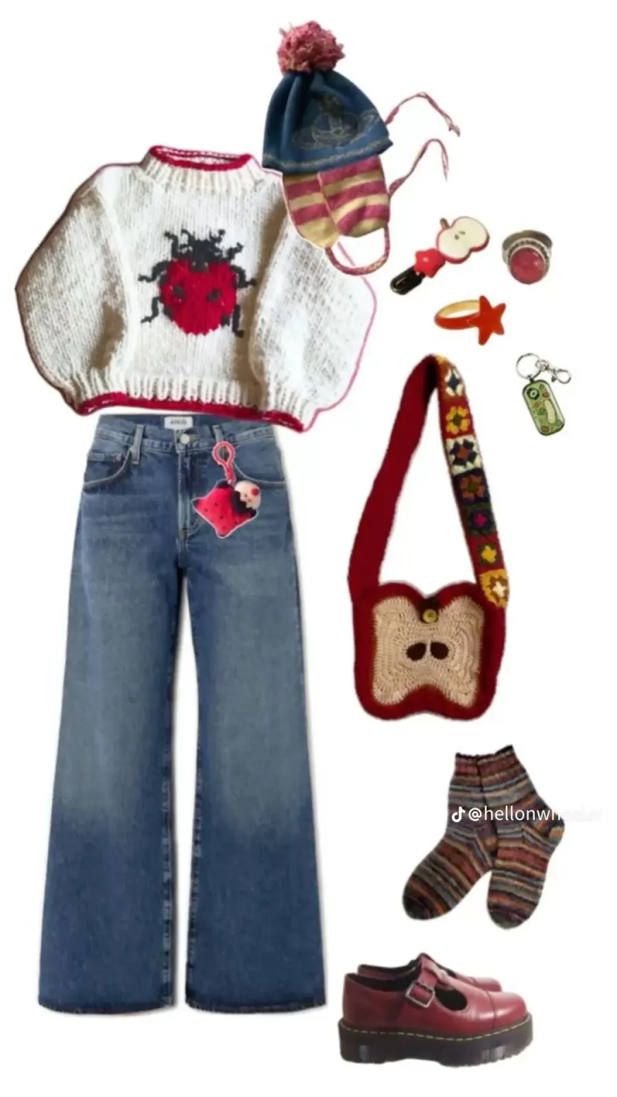 Whimsy Twee aesthetic — The image strongly aligns with the Whimsy Twee aesthetic, featuring a patterned knit sweater with a ladybug motif, layered clothing (jeans, socks), and playful accessories like a fruit-shaped bag and novelty rings. The overall vibe is bright, childlike, and deliberately uncool, fitting the description's emphasis on pattern mixing, primary colors, and fantasy motifs.