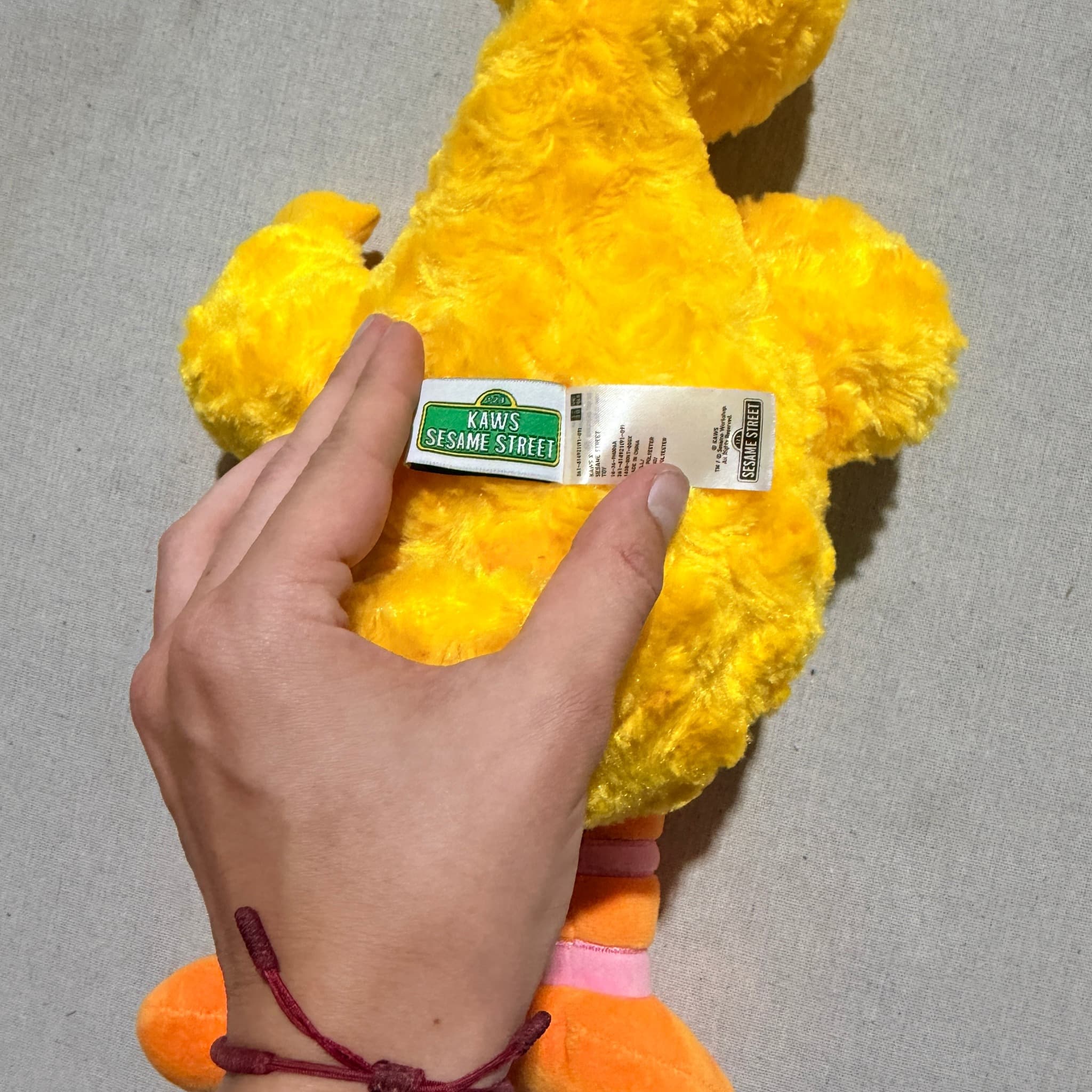 KAWS x Sesame Street Big Bird Plush Toy Yellow — photo 6 of 7