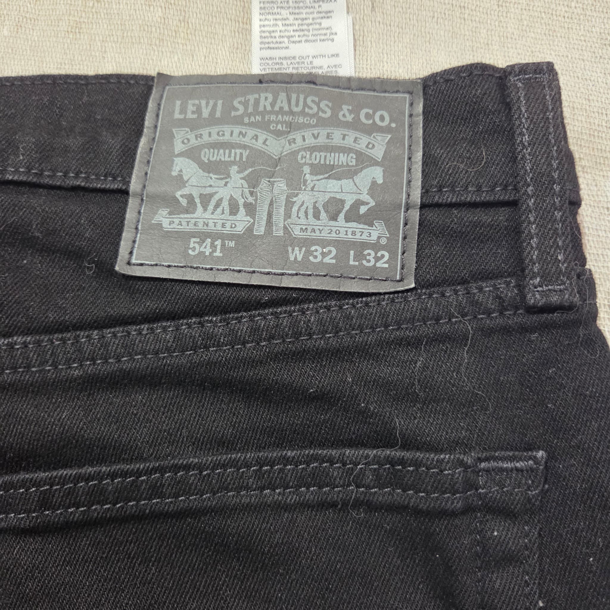 Levi's 541 Athletic Taper Black Jeans — photo 9 of 10