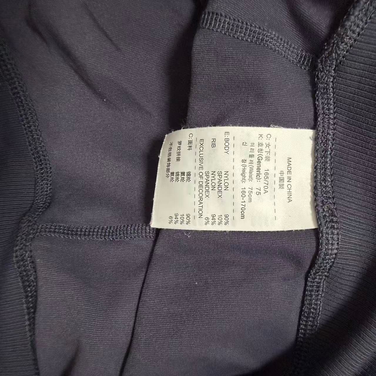 Nike Dri-Fit Women's Yoga Flare Pants Black Green — photo 3 of 10