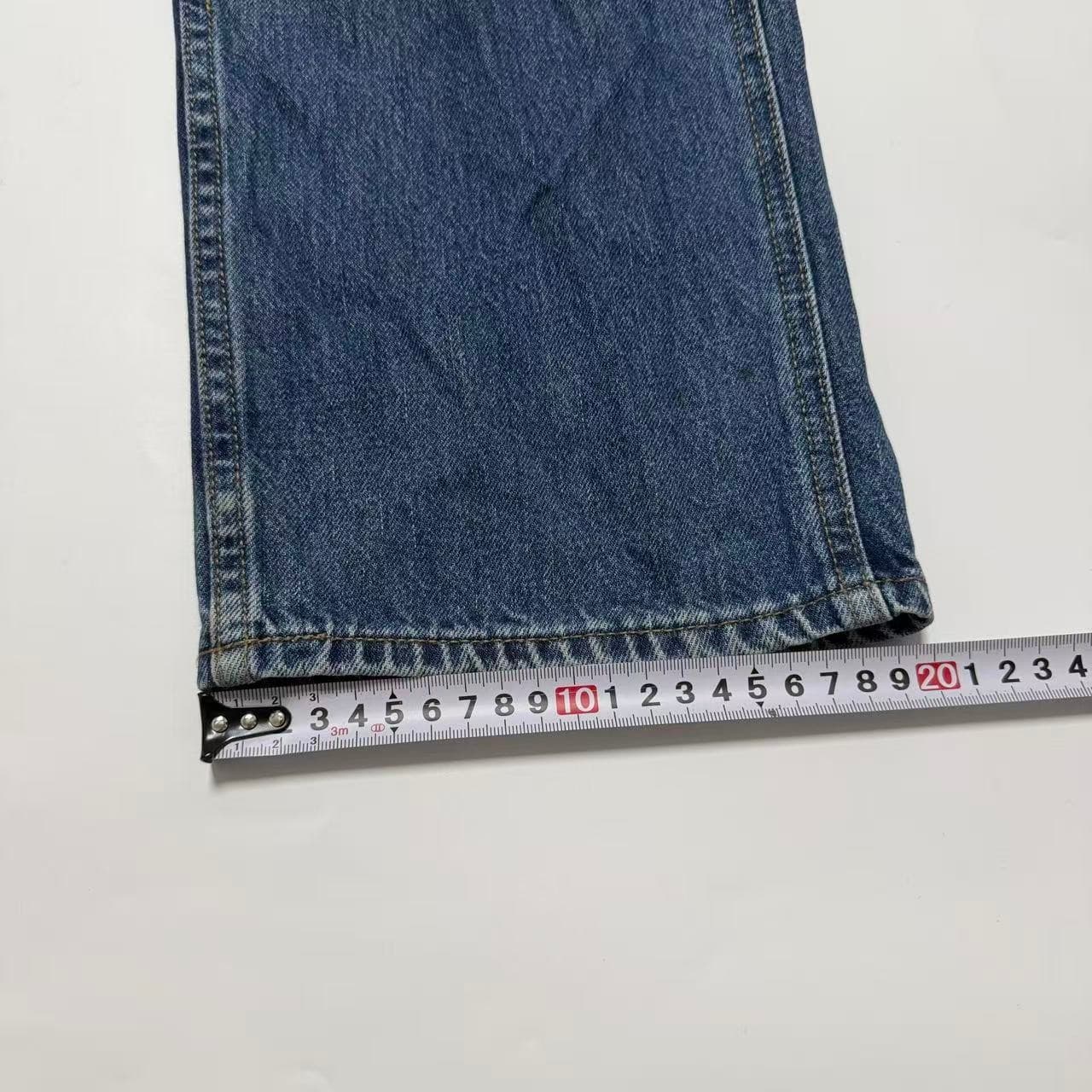 Uniqlo U Relaxed Fit Tapered Leg Jeans — photo 7 of 8