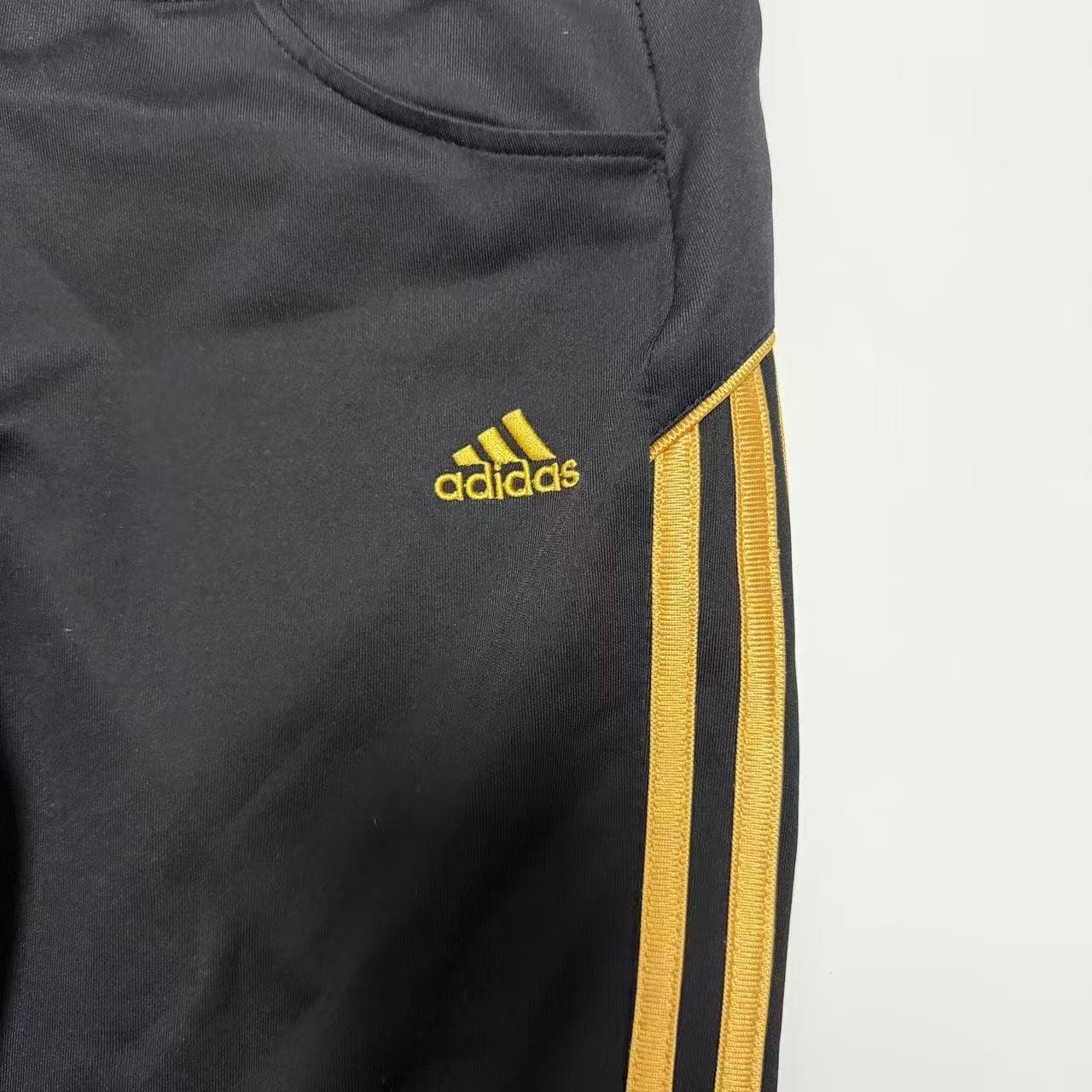 Vintage Adidas Women's Black & Gold Wide Leg Track Pants — photo 4 of 10
