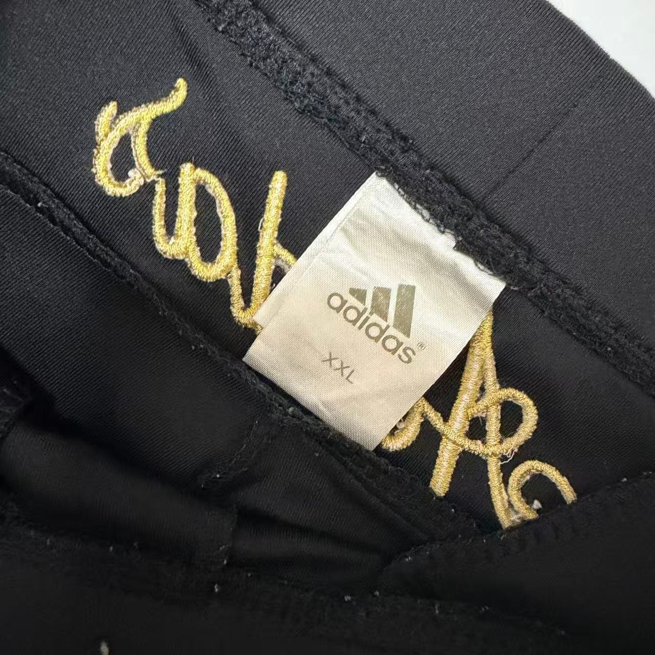 Vintage Adidas Women's Black & Gold Wide Leg Track Pants — photo 5 of 10
